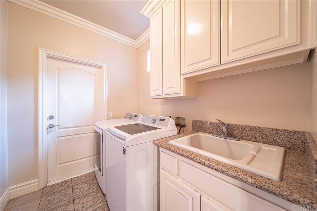 5237 Temple City Boulevard Temple City, CA 91780 - Photo 8 of 23 a utility room with dryer and washer