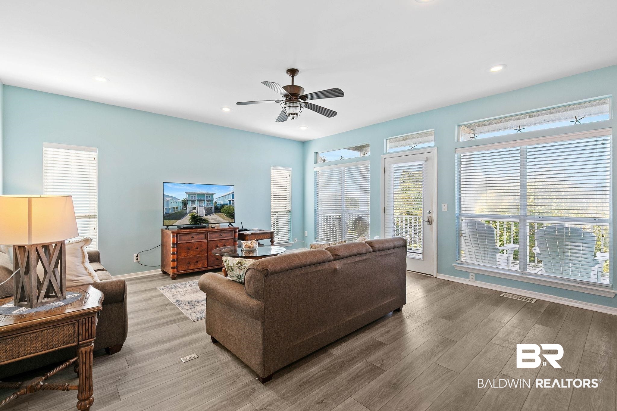 545 Plantation Road, Unit 3 Gulf Shores, AL 36542 - Photo 7 of 54 Living area featuring recessed lighting, a ceiling fan, and wood finished floors