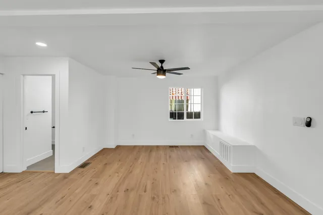 a kitchen with sink cabinets and window
