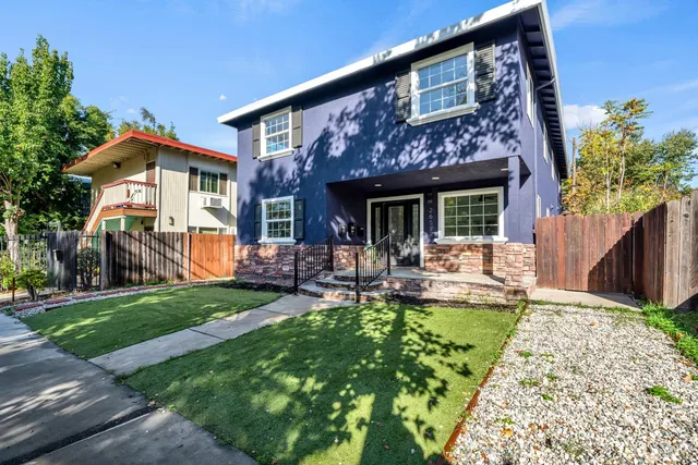 a living room with furniture and window