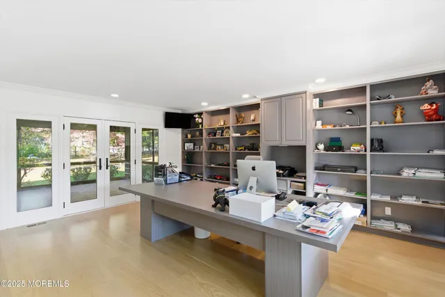 a bathroom with a glass shower door