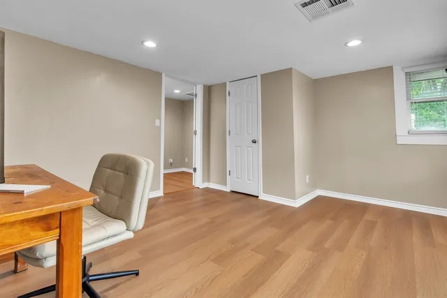 a view of livingroom with furniture and a window