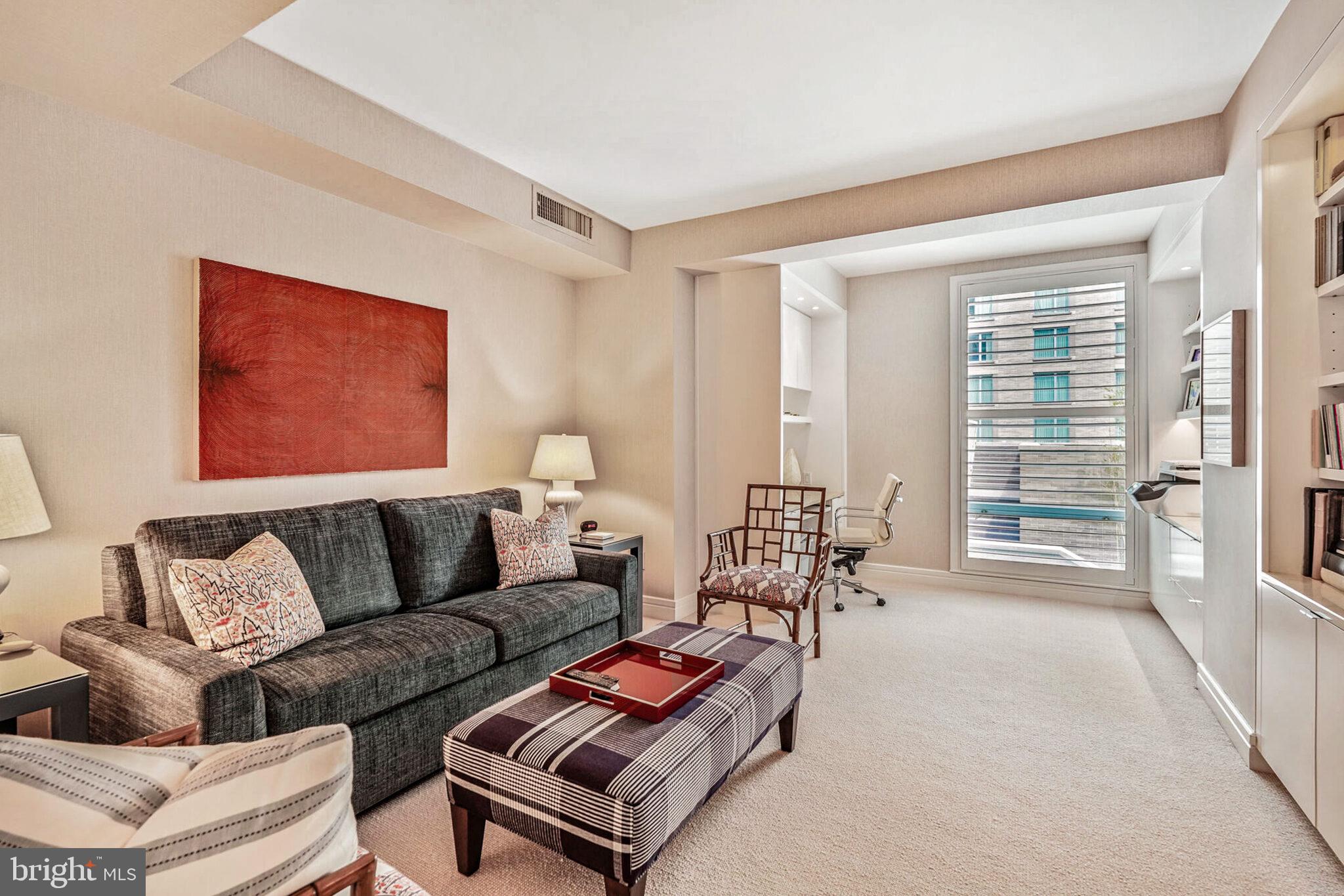 1111 23rd Street Northwest, Unit 4F Washington, DC 20037 - Photo 20 of 27 a living room with furniture and a large window