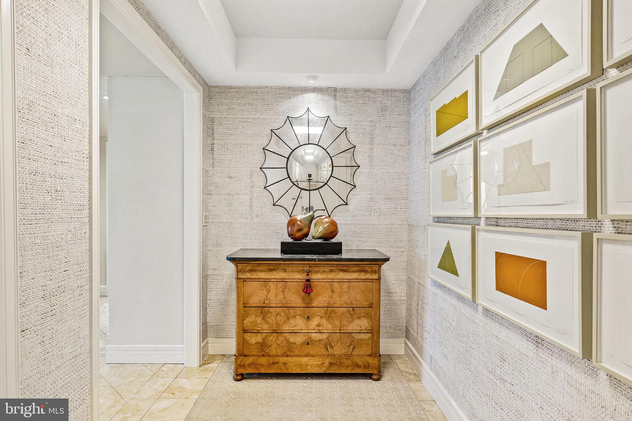 1111 23rd Street Northwest, Unit 4F Washington, DC 20037 - Photo 2 of 27 a front view of a house with a garage