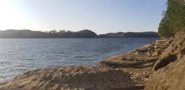 a view of lake with mountain