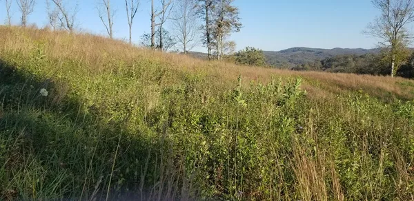 a view of mountain view with mountains in the background