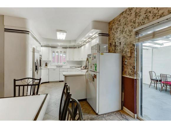 577 East 8th Street Brooklyn, NY 11218 - Photo 4 of 8 kitchen/dinette in duplex