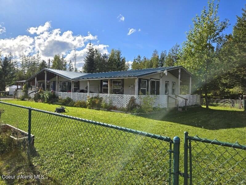 871 Foothill Drive Athol, ID 83801 - Photo 4 of 46 front house fenced