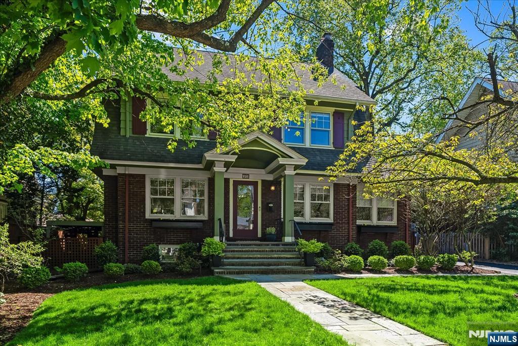 231 Watchung Avenue Montclair, NJ 07043 - Photo 1 of 3 front view of a brick house with a yard