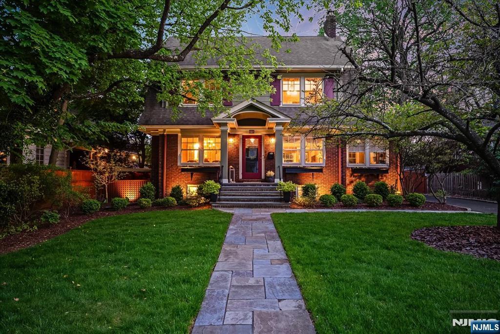 231 Watchung Avenue Montclair, NJ 07043 - Photo 2 of 3 a front view of a house with a yard