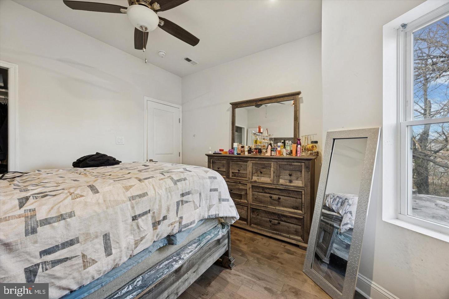 5227 Walnut Street Philadelphia, PA 19139 - Photo 4 of 6 a bedroom with a bed and furniture