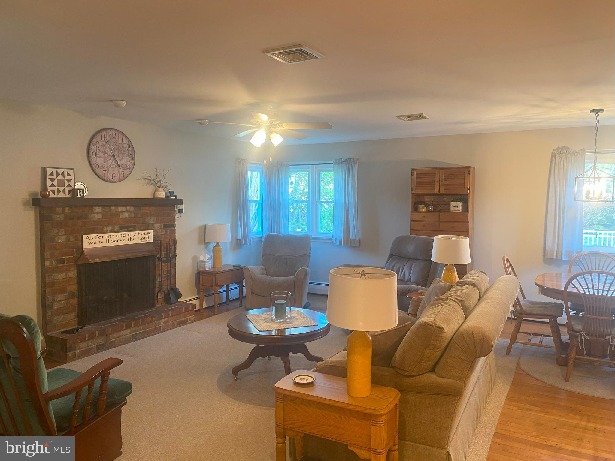 104 Sunnybrook Road Cherry Hill, NJ 08034 - Photo 12 of 39 a living room with furniture a fireplace and a potted plant