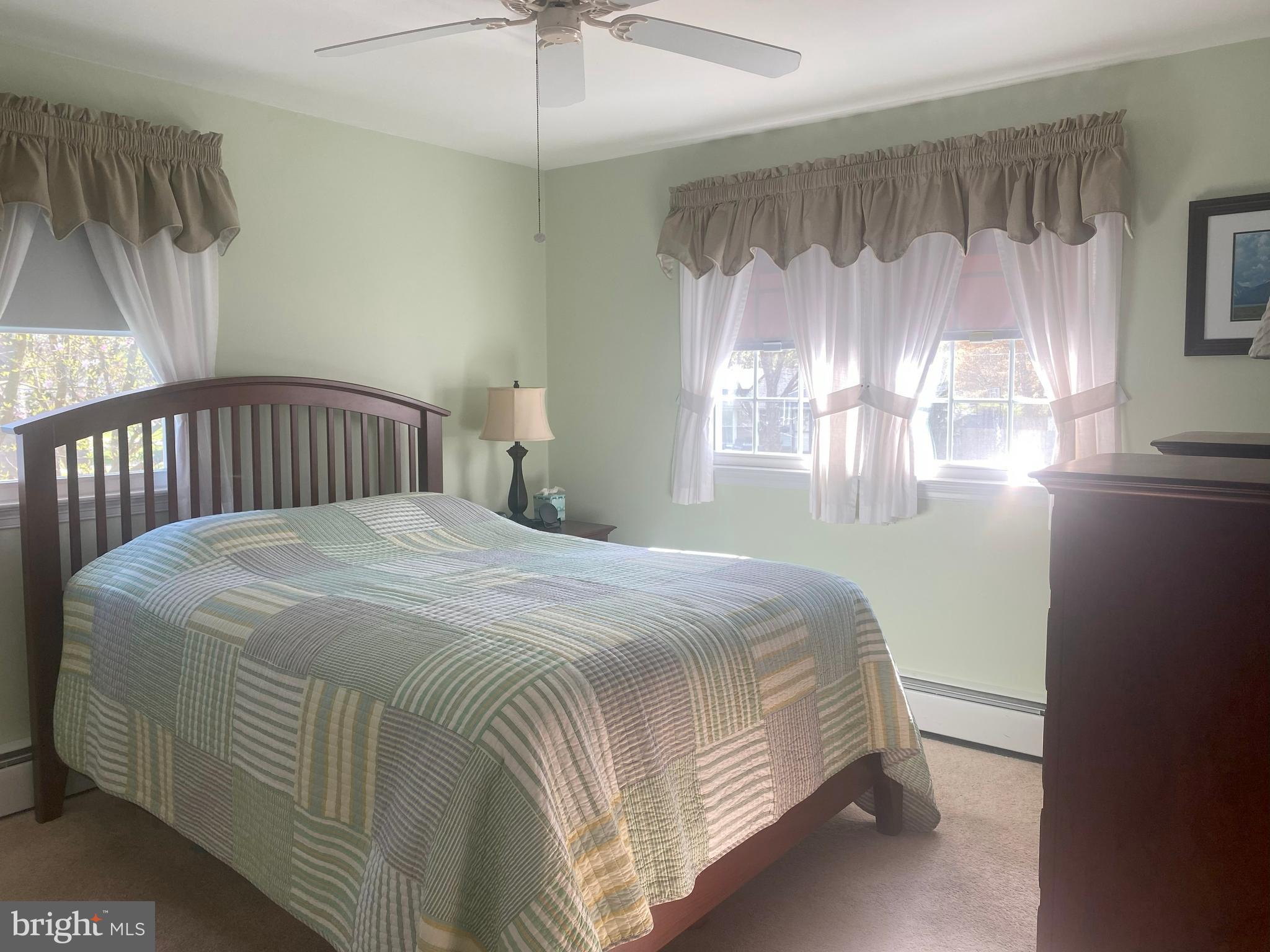 104 Sunnybrook Road Cherry Hill, NJ 08034 - Photo 13 of 39 a bedroom with a bed and a window