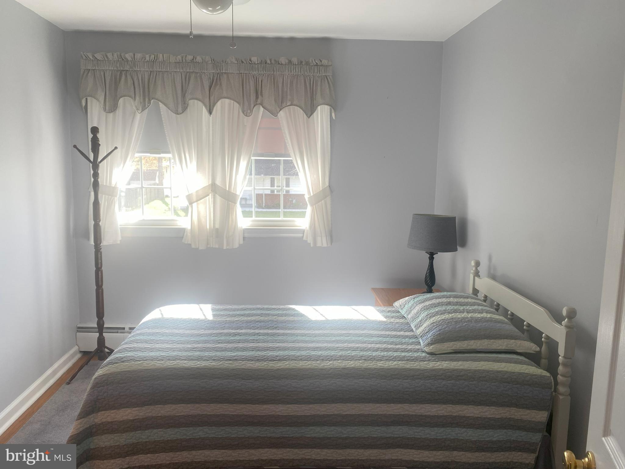 104 Sunnybrook Road Cherry Hill, NJ 08034 - Photo 18 of 39 a bedroom with a bed and a window