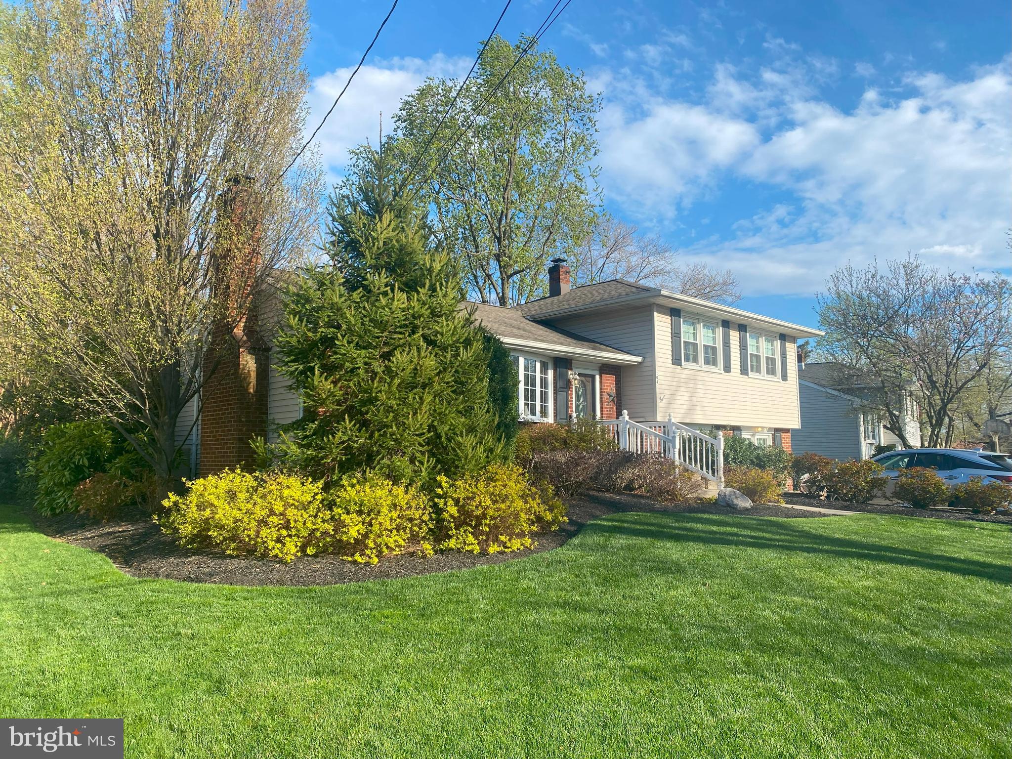104 Sunnybrook Road Cherry Hill, NJ 08034 - Photo 2 of 39 a front view of a house with a garden