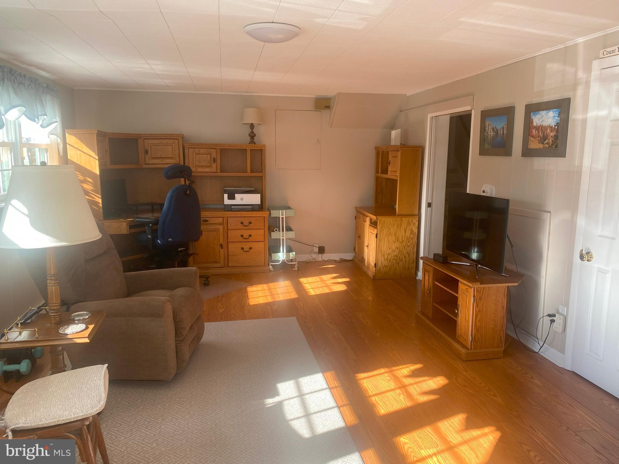 104 Sunnybrook Road Cherry Hill, NJ 08034 - Photo 28 of 39 a living room with furniture and a flat screen tv
