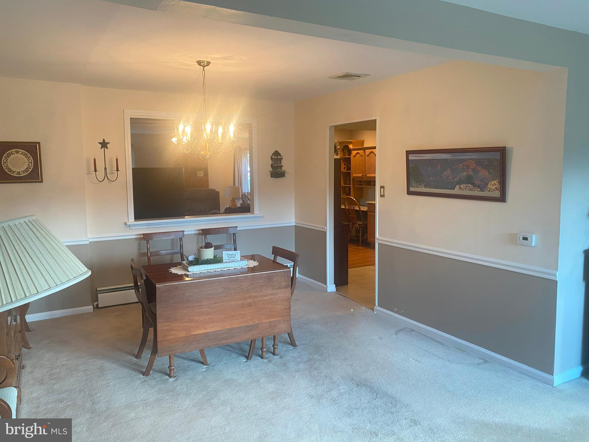 104 Sunnybrook Road Cherry Hill, NJ 08034 - Photo 7 of 39 a living room with furniture and a flat screen tv