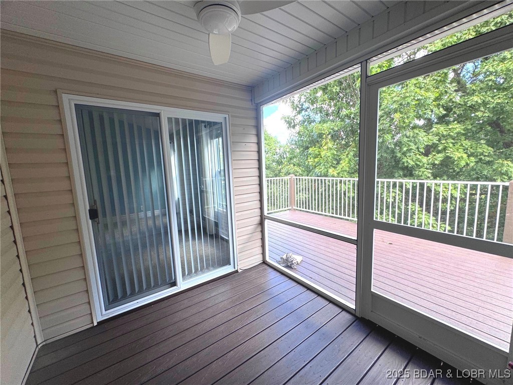 4331 Sunset Drive, Unit B Osage Beach, MO 65065 - Photo 17 of 36 Off primary suite and living room-screened in