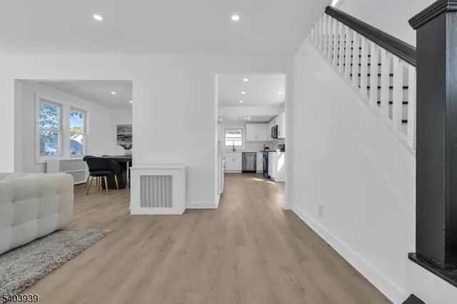 a view of livingroom with furniture and wooden floor