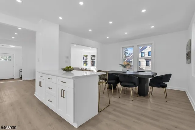 a kitchen with cabinets and sink