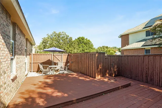 a view of backyard with green space