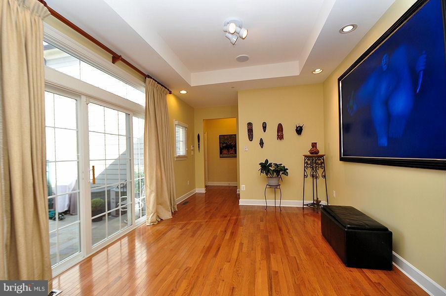 7671 Midtown Road Fulton, MD 20759 - Photo 13 of 30 Tray ceiling in breakfast area and slider to patio