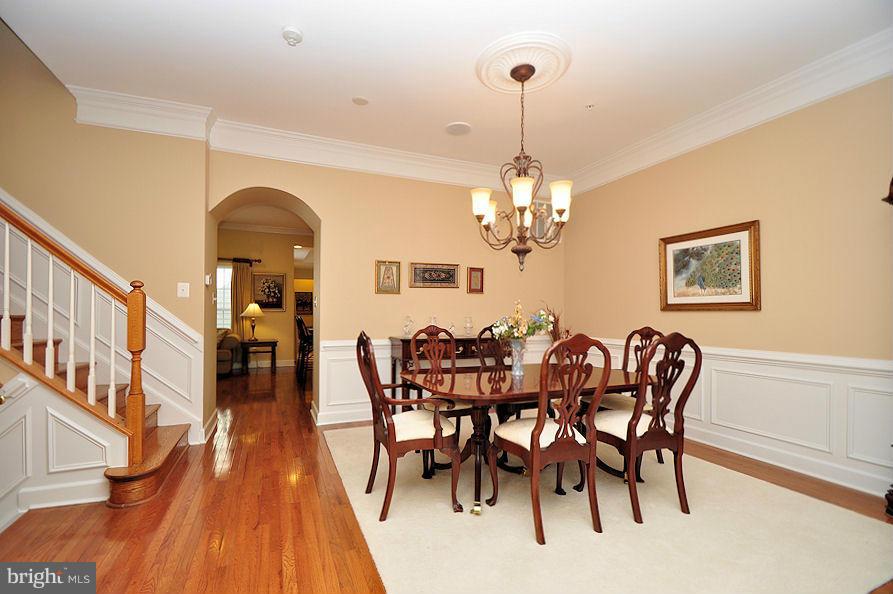 7671 Midtown Road Fulton, MD 20759 - Photo 6 of 30 Formal dining room with upgraded chandelier