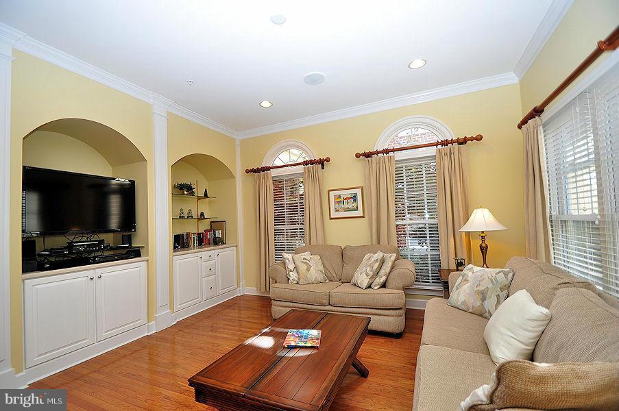 7671 Midtown Road Fulton, MD 20759 - Photo 7 of 30 Custom alcoves w/glass shelving in family room