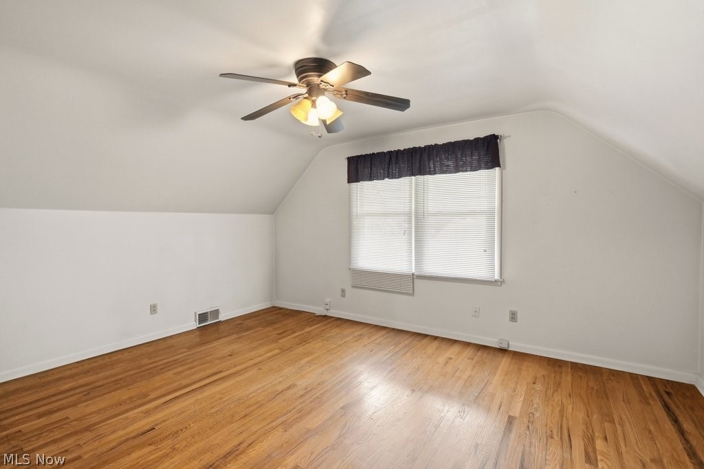 161 Pinehurst Road Munroe Falls, OH 44262 - Photo 23 of 40 Room featuring wood-finish flooring, a ceiling fan with integrated lighting, and a double window