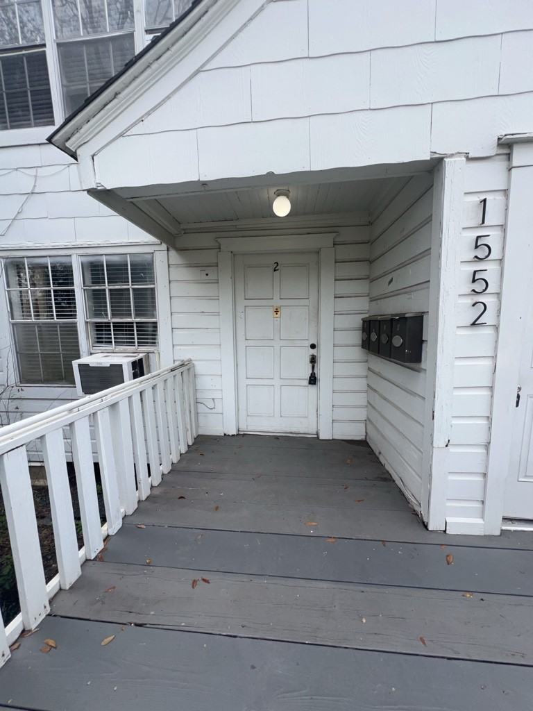 1552 Lombardy Street, Unit 2 Houston, TX 77023 - Photo 3 of 17 a view of a car garage gate