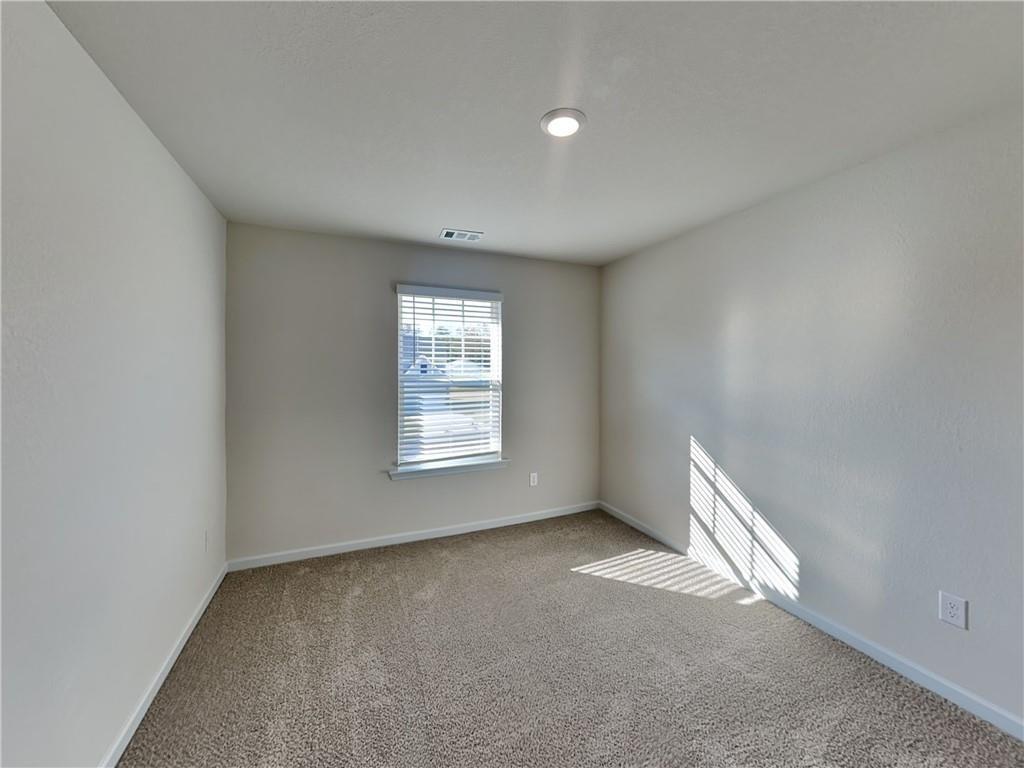1205 Fendt Drive Locust Grove, GA 30248 - Photo 11 of 19 an empty room with a window