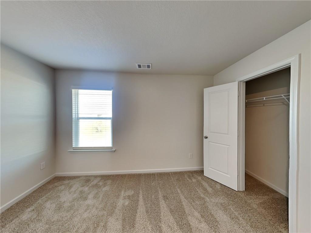 1205 Fendt Drive Locust Grove, GA 30248 - Photo 13 of 19 an empty room with a window