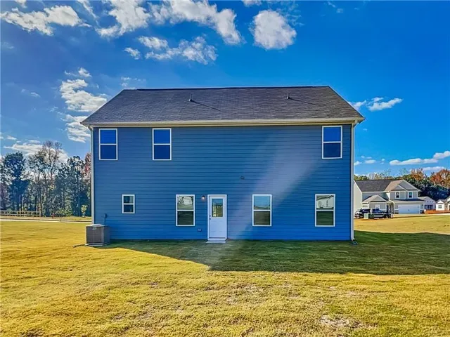 a view of a house with a swimming pool