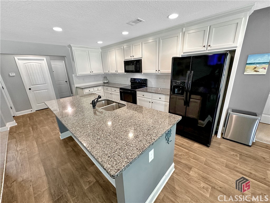 87 Evergreen Ridge Court Statham, GA 30666 - Photo 24 of 36 Large Kitchen Island