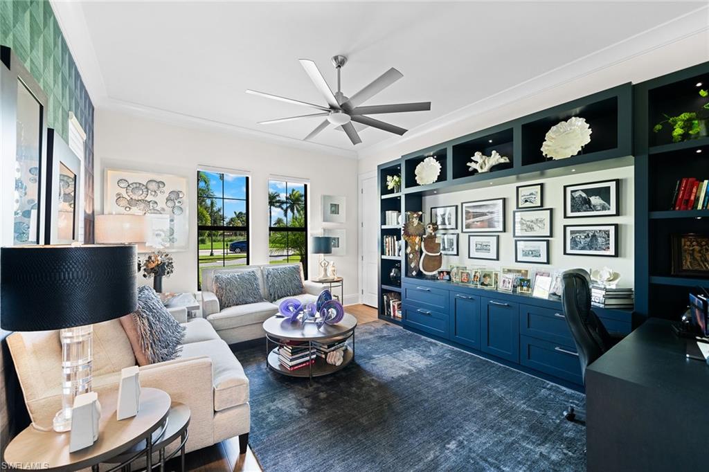 12499 Twin Eagles Boulevard Naples, FL 34120 - Photo 22 of 50 a living room with furniture and a flat screen tv