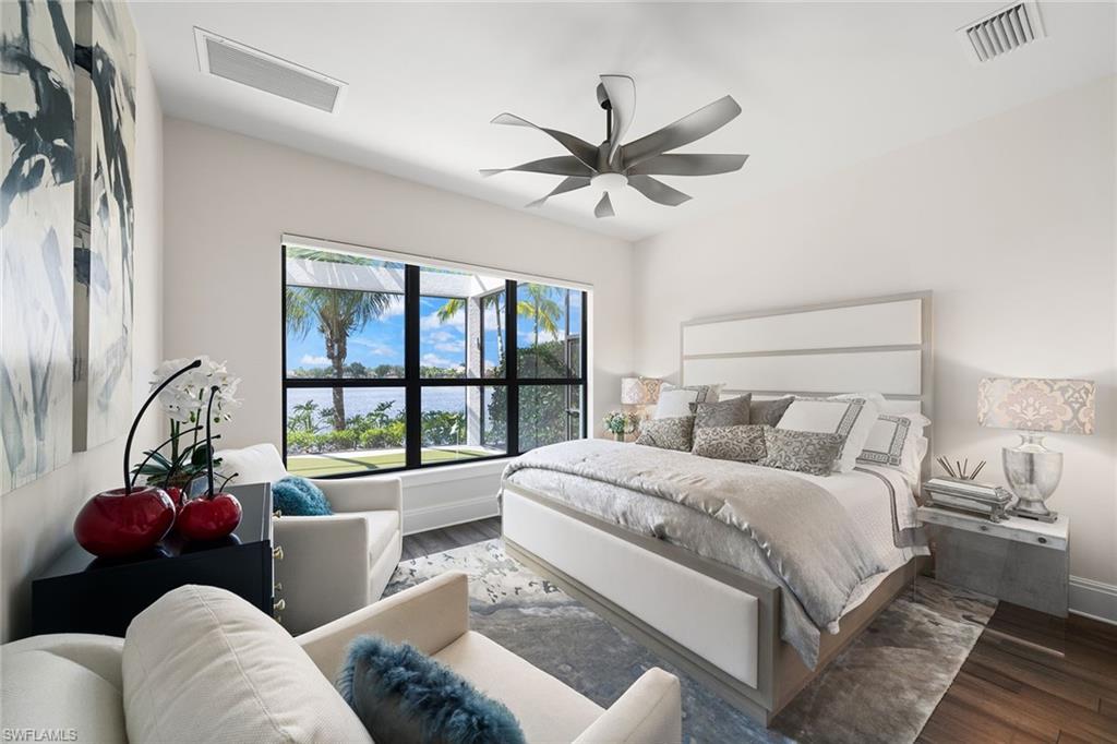 12499 Twin Eagles Boulevard Naples, FL 34120 - Photo 23 of 50 a living room with a couch and a large window