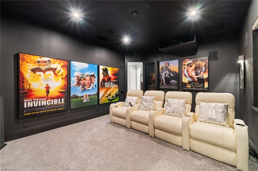 12499 Twin Eagles Boulevard Naples, FL 34120 - Photo 29 of 50 a living room with furniture and a flat screen tv