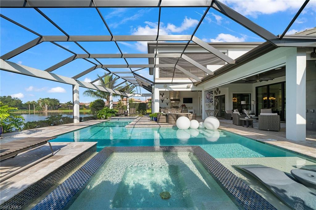 12499 Twin Eagles Boulevard Naples, FL 34120 - Photo 34 of 50 a view of swimming pool with outdoor seating