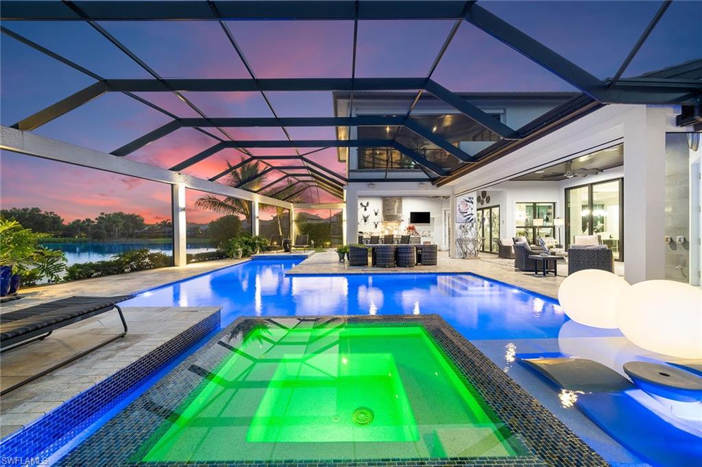 12499 Twin Eagles Boulevard Naples, FL 34120 - Photo 35 of 50 a view of a backyard with swimming pool