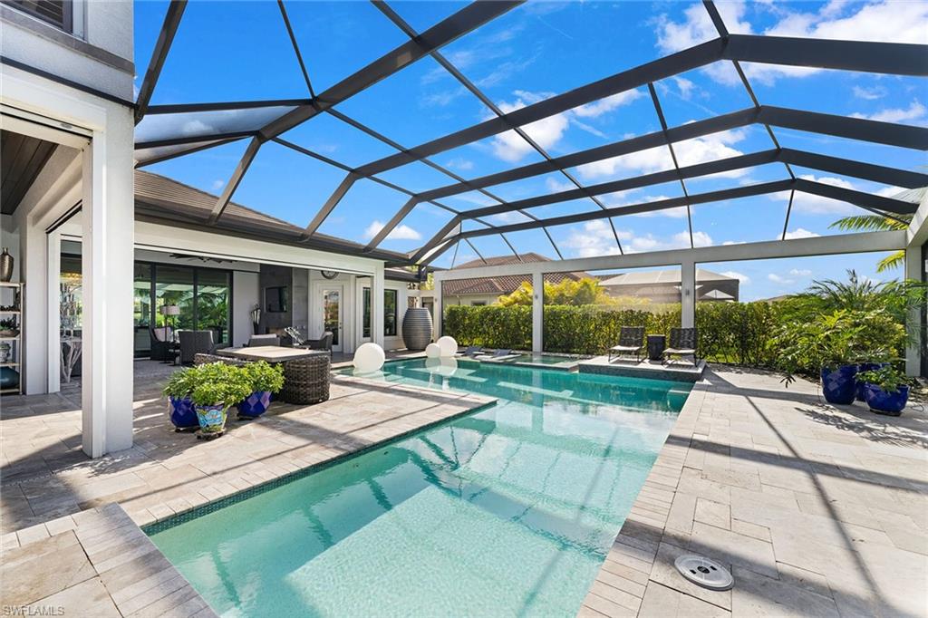 12499 Twin Eagles Boulevard Naples, FL 34120 - Photo 36 of 50 a view of swimming pool with a patio