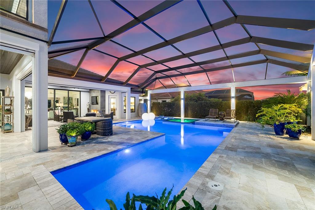 12499 Twin Eagles Boulevard Naples, FL 34120 - Photo 37 of 50 a view of swimming pool with outdoor seating