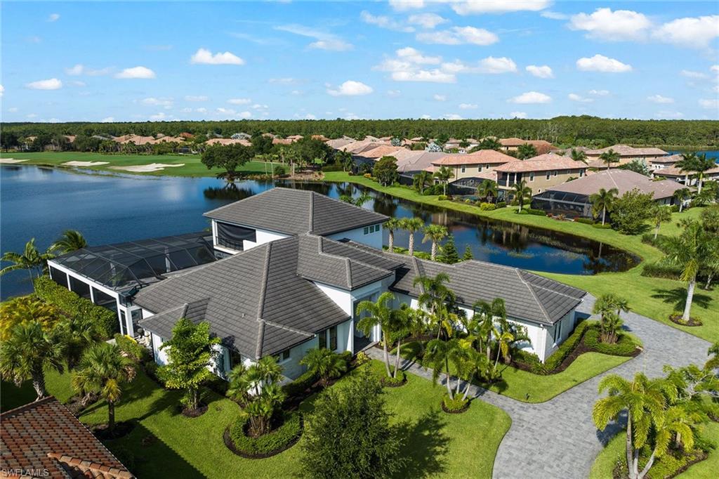 12499 Twin Eagles Boulevard Naples, FL 34120 - Photo 44 of 50 an aerial view of a house with a yard