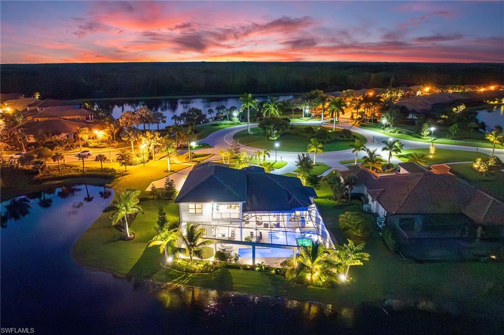 12499 Twin Eagles Boulevard Naples, FL 34120 - Photo 49 of 50 a view of a lake with a big yard