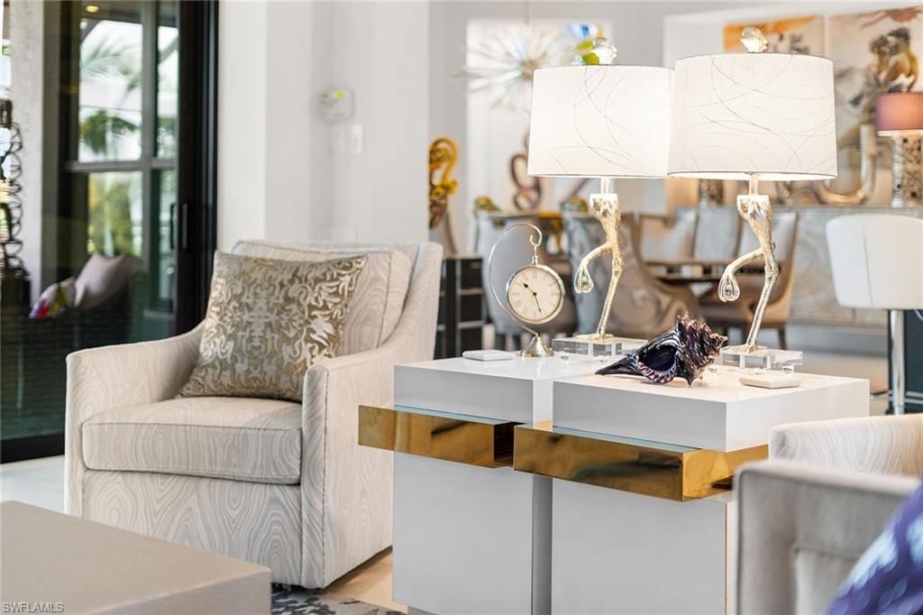12499 Twin Eagles Boulevard Naples, FL 34120 - Photo 9 of 50 a living room with furniture and a window