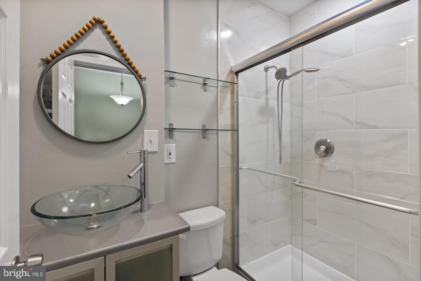 225 14th Place Northeast Washington, DC 20002 - Photo 17 of 20 Sleek modern bathroom oasis.