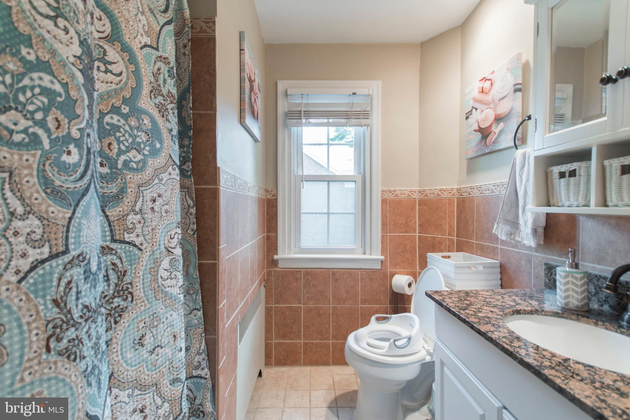 909 Ashbourne Road Cheltenham, PA 19012 - Photo 25 of 36 Hall bathroom