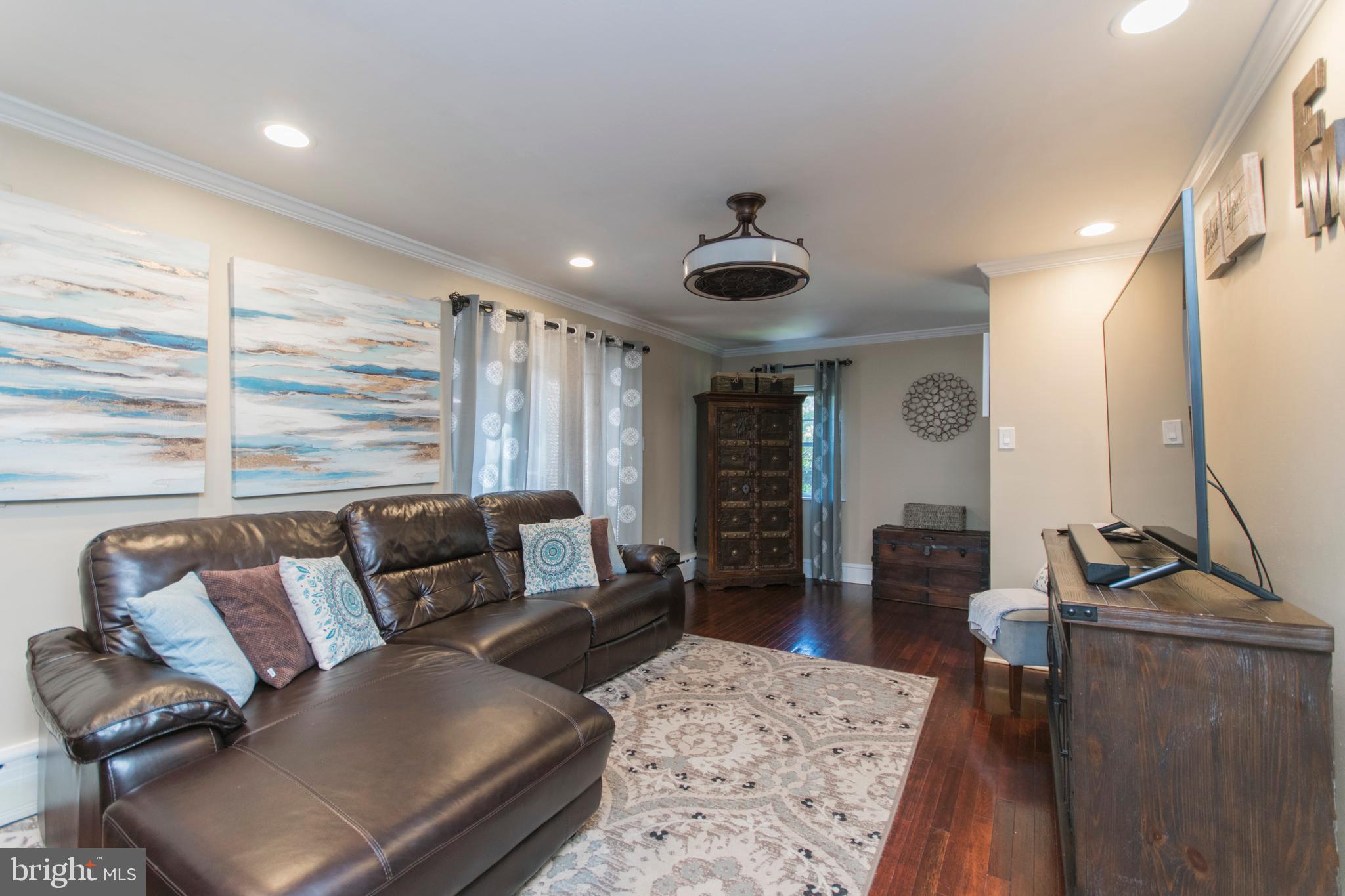 909 Ashbourne Road Cheltenham, PA 19012 - Photo 10 of 36 And family room . . .