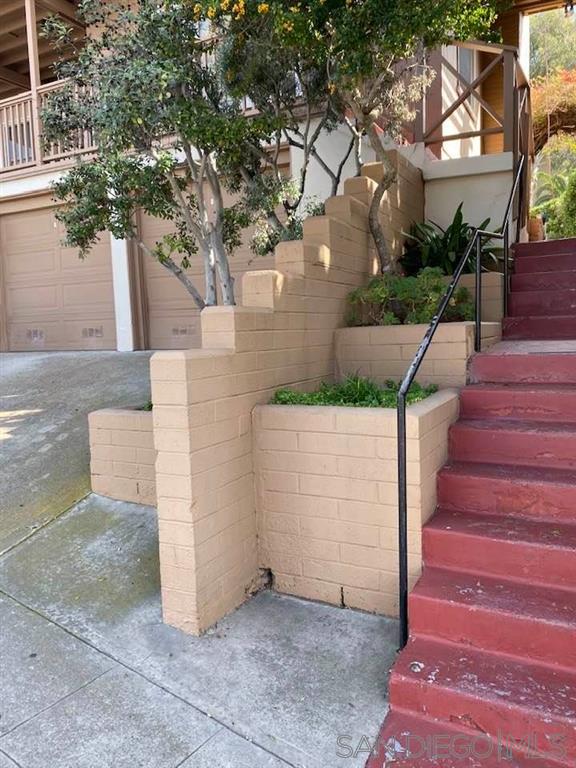 317 Prospect Street La Jolla, CA 92037 - Photo 1 of 24 a view of a house with a yard