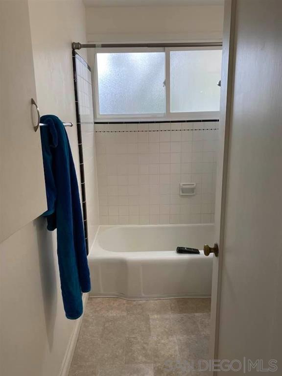 317 Prospect Street La Jolla, CA 92037 - Photo 12 of 24 a bathroom with a bathtub