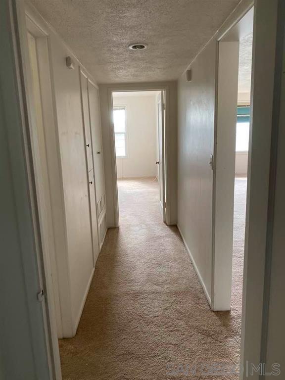 317 Prospect Street La Jolla, CA 92037 - Photo 13 of 24 a view of hallway with shower